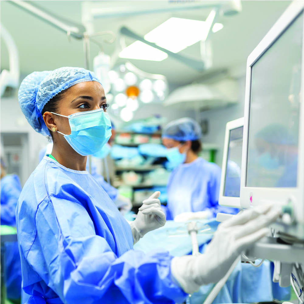 Surgeon using a vitals monitor